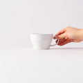 Colored Rim Wide Mug in White, held in hand