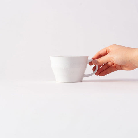 Colored Rim Wide Mug in White, held in hand