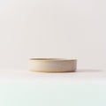 Stackable Organic Deep Plate Small in Ivory, side view